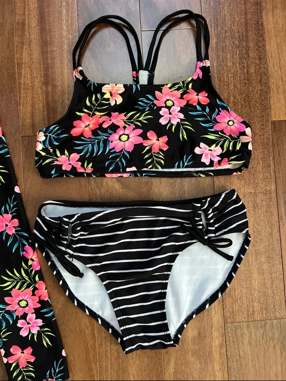 art class Black Rash Guard Swim Set with Pink Floral Sleeves & Striped Bottoms